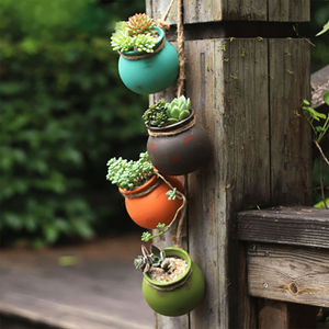 4pcs Wall-mounted Ceramic Hanging Flower Pots